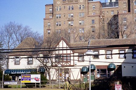 The Two Story Tudor Building as seen from the Jamaica bound platform of the Long Island Rail Road Station in Februayr of 2002 in Kew Gardens, NY, 2004.