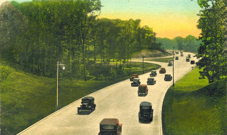 The Interborough Parkway (renamed the Jackie Robinson Parkway) looking west through Forest Park from Kew Gardens, NY.