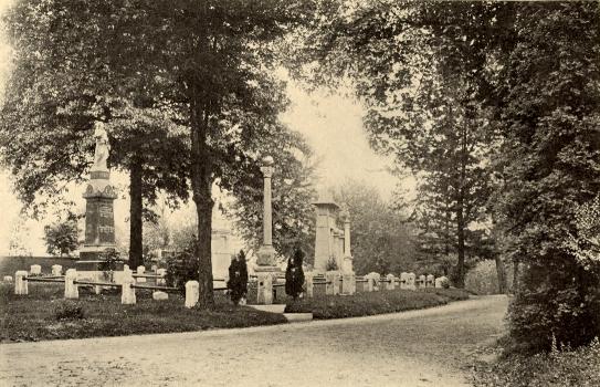 The Prospect section of Maple Grove Cemetery in Jamaica (Kew Gardens), NY just past the Administrative Office.